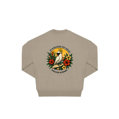 Rückseite beiger oversized Pullover mit Kakado-Aufdruck in botanischem Gewand aus der Summer Birdy Kollektion