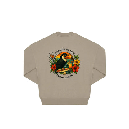 Rückseite beige farbiger oversized Pullover mit Tukan-Aufdruck in botanischem Gewand aus der Summer Birdy Kollektion