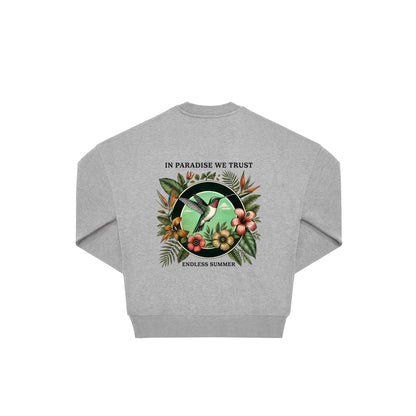 Rückseite grauer oversized Pullover mit Kolibri-Aufdruck in botanischem Gewand