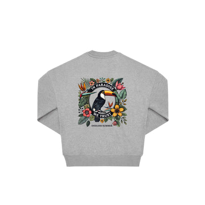 Rückseite grauer oversized Pullover mit Turkan-Aufdruck in botanischem Gewand